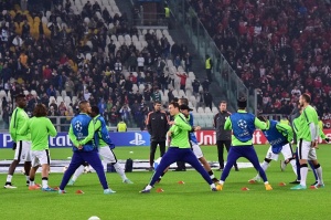 Juventus players warm up before the Champions League Group A qualifying football match Juventus vs Olympiakos at the Juventus stadium in Turin on November 4, 2014. AFP PHOTO / GIUSEPPE CACACE (Photo credit should read GIUSEPPE CACACE/AFP/Getty Images)